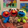 image:imageGUND Sesame Street Cookie Monster x Oscar the Grouch BuddyUp Plush Stuffed  Includes One Soft and Huggable Stuffed Animal Plush Toy Inspires Pretend Play Dress Up Play Cuddling and Nurturing Skills